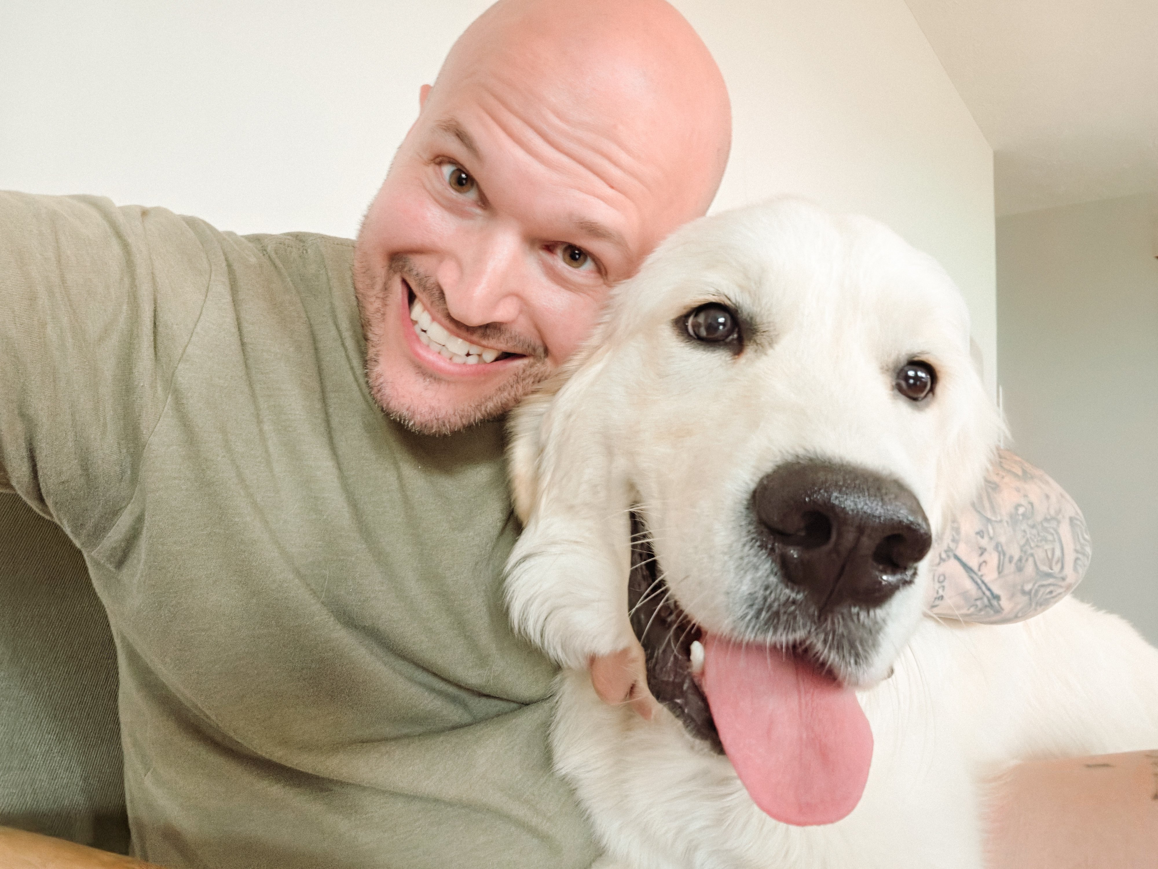 Scott with his English Cream Golden Retriever, Lux.